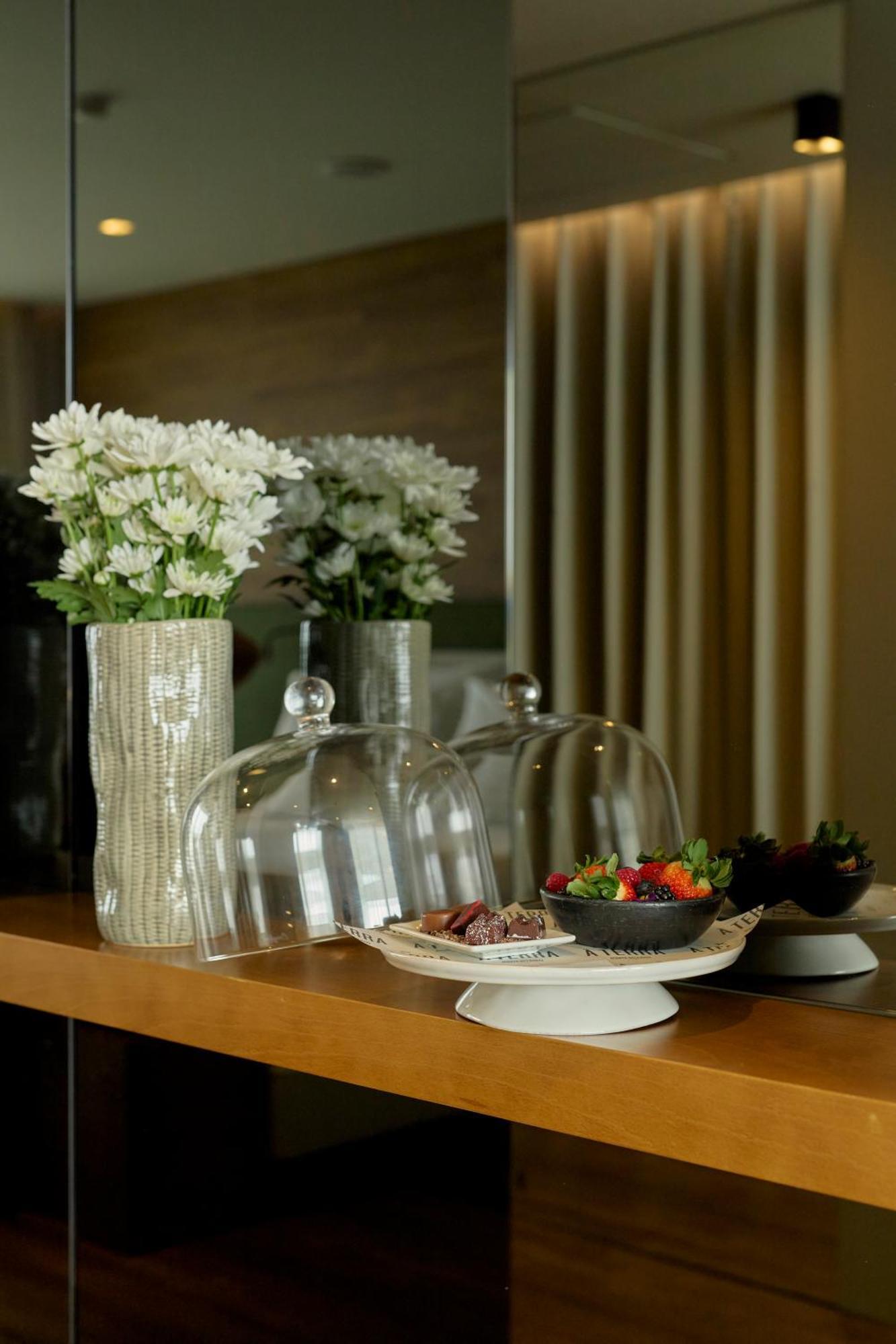 Octant Ponta Delgada Hotel Exterior foto A cake stand with a glass dome